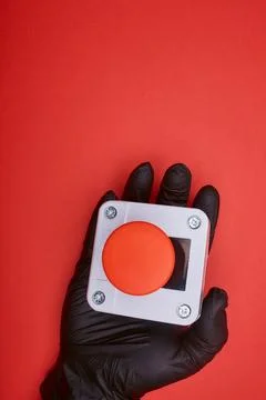 The hand which keep the emergency button Stock Photos