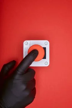 The hand which pushes the emergency button Stock Photos