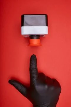 The hand which pushes the emergency button Stock Photos