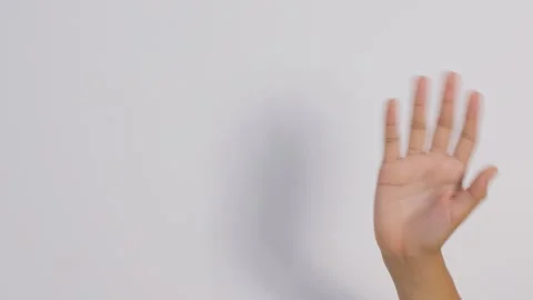Hand on white background waving Stock Footage 309736721