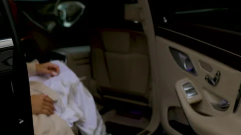 Hand in white gloves open black car door Video stock 164734463