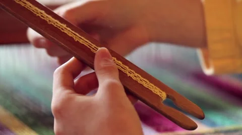 Hand winding a weaving shuttle Stock Footage 48718138