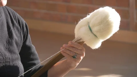 Hand Winding Wool Yarn On A Spindle Authentic Traditional Way (5 of 13) Stock Footage 98320832
