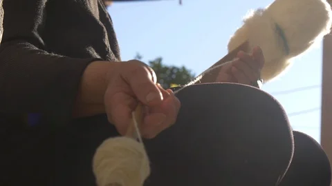 Hand Winding Wool Yarn On A Spindle Authentic Traditional Way (11 of 13) Stock Footage 98340092