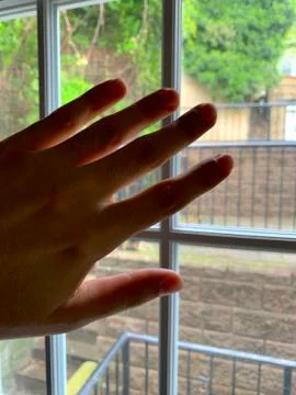 Hand in Window Stock Photos