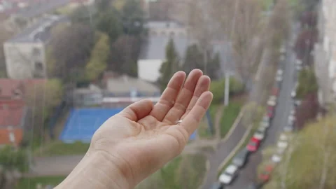Hand on the window in the spring hail. Weather concept. Stock Footage 151681147