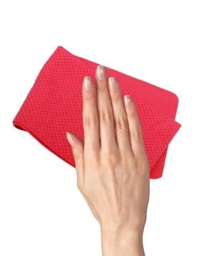 Hand wiping surface with red rag isolated on white Fotos de archivo