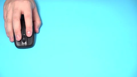 Hand with Wireless Computer Mouse Moves and Clicks Video stock 151531708