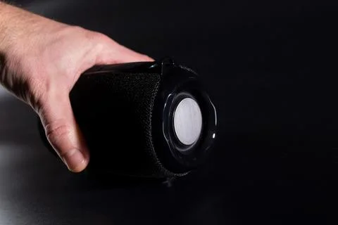 Hand with wireless speaker. Stock-Fotos