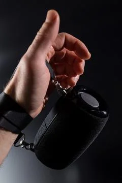 Hand with wireless speaker. Stock Photos