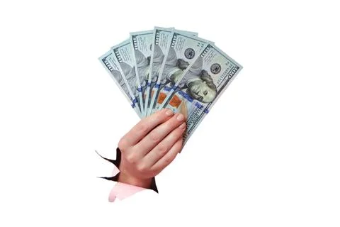 Hand of a woman holding a stack of one hundred dollar bills isolated on a w.. Stock Photos