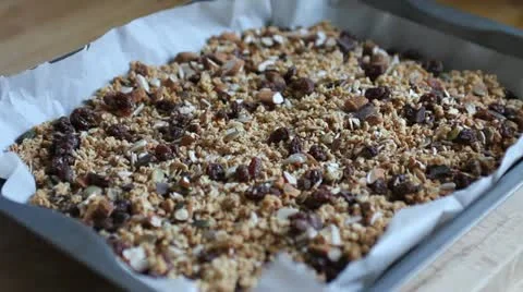 Hand of a woman touching granola Stock Footage