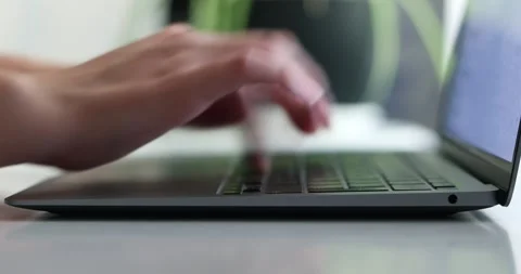 Hand of woman using laptop computer to work, typing at home and scrolling, wh Stock-Footage 300364148