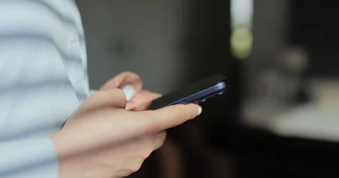 Hand of woman using texting mobile phone or chat. Close up of woman hand. Stock Footage 335884770