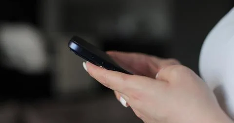 Hand of woman using texting mobile phone or chat. Close up of woman hand. 스톡 사진