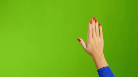Hand woman waving hello or goodbye on green screen background Stock Footage