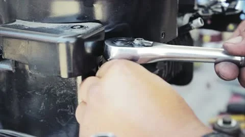 Hand At work on Engine Stock Footage 12317423