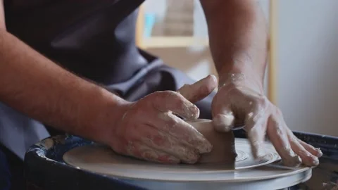 Hand work on pottery wheel, shaping a clay pot Vídeo Stock 142675351