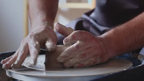 Hand work on pottery wheel, shaping a clay pot Vídeo Stock 143614706