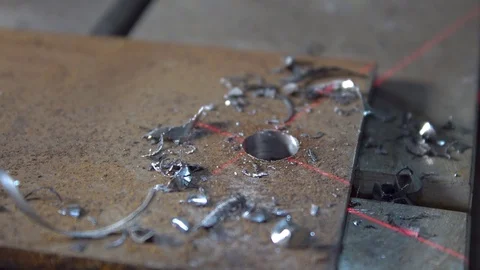 Hand worker sweeps brush metal shavings Stock Footage 117932941