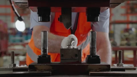 Hand of worker uses a magnetic holder to hold the workpiece. Stock Footage 172575176