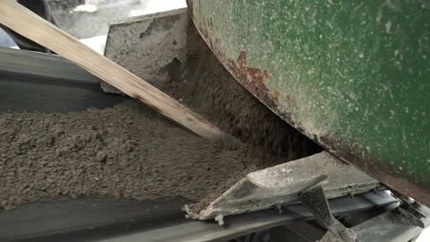 Hand of a worker, who uses a tool to clean the tank with building materials Stock Footage 200869360