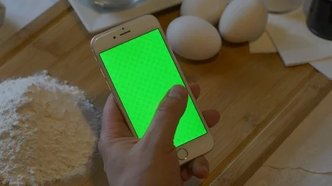 Hand working with iPhoone. Ready for post-production Stock Footage 91332516