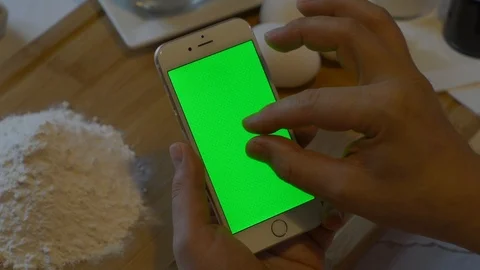 Hand working with iPhoone. Ready for post-production Stock Footage 91332542