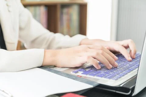 Hand working on laptop Stock Photos