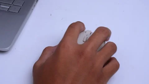 Hand working with mouse on white table Stock Footage 270509298