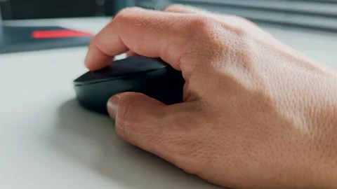 Hand of working person holding computer mouse on desk. Work concept Stock Footage 331817053