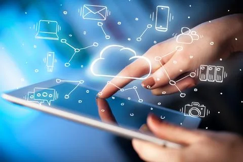 Hand working on tablet with cloud technology system concept Stock Photos