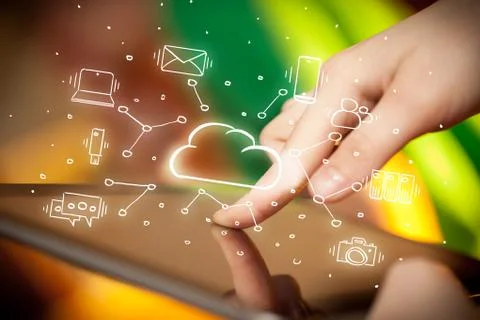 Hand working on tablet with cloud technology system concept Stock Photos