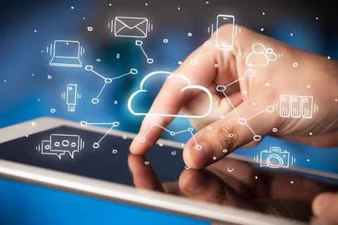 Hand working on tablet with cloud technology system concept Stock Photos