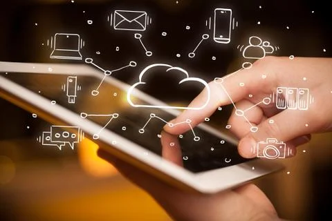 Hand working on tablet with cloud technology system concept Stock Photos