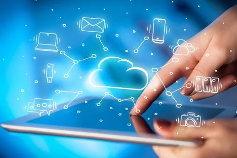 Hand working on tablet with cloud technology system concept Stock Photos