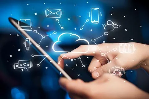 Hand working on tablet with cloud technology system concept Stock Photos