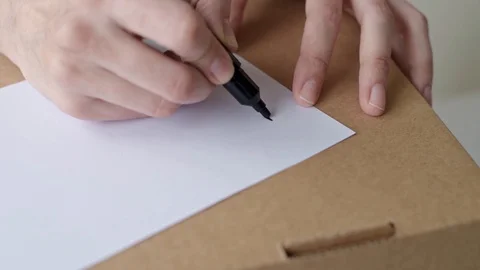 Hand write inscription donate on the donation box, close up Stock Footage 130140582