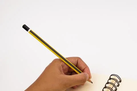 Hand write on the notebook Stock Photos