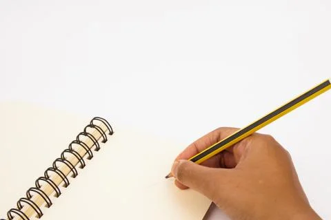 Hand write on the notebook Stock Photos