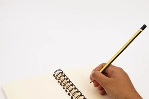 Hand write on the notebook Stock Photos