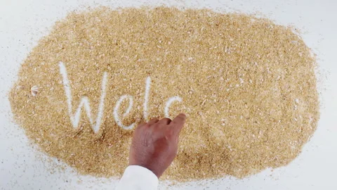 Hand Writes On Beach Sand word Welcome Stock Footage 248660024