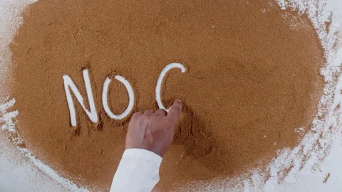 Hand writes on brown soil words No Gmo Stock Footage 248676505