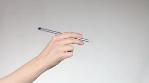 Hand writes pencil in the air. Stock Footage 60405209