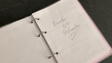 Hand writes with a pencil in a notebook Stock Footage 160145666