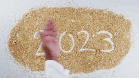 Hand Writes On Sand 2023 Video stock 148428434