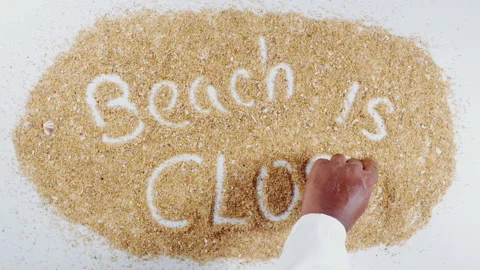 Hand Writes On Sand Beach is Closed Stock-Footage 148452267