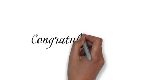 Hand writes on a white background the word congratulations Stock Footage 150424664