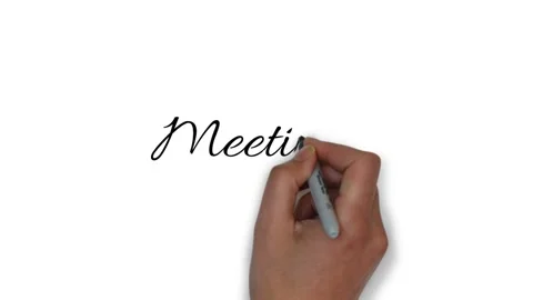 Hand writes on a white background the word meetings Stock Footage 150424679