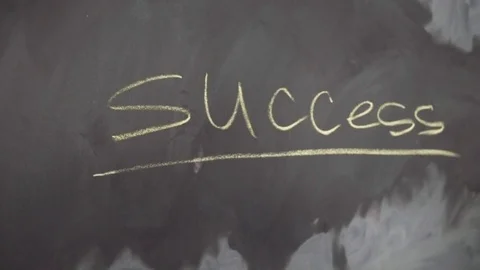 Hand writes the word success Stock Footage 81303357